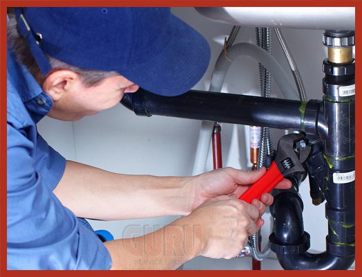 Plumber from Guru Plumbing fixing water pipe