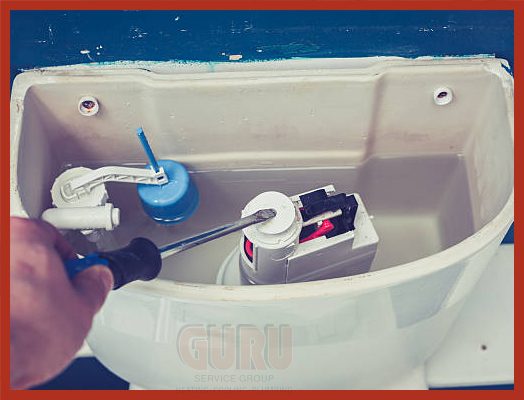 Skilled technician conducting water closet repair